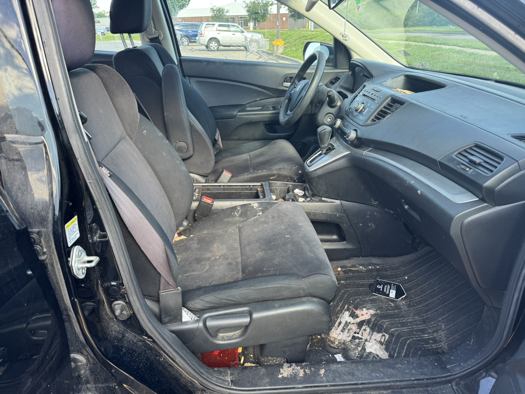 Before: dirty CR-V front interior with stains