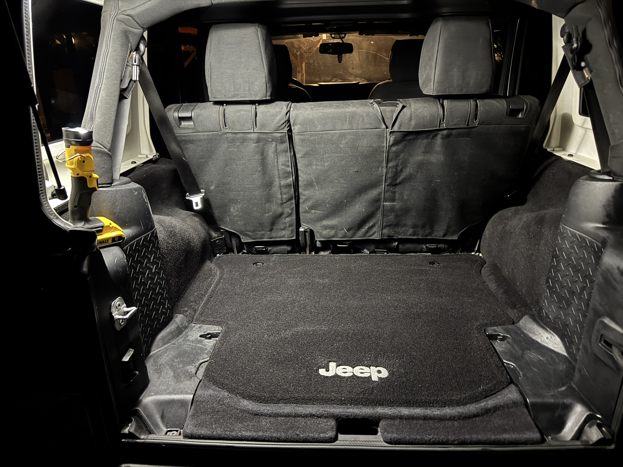 After: vacuumed and detailed Jeep cargo area